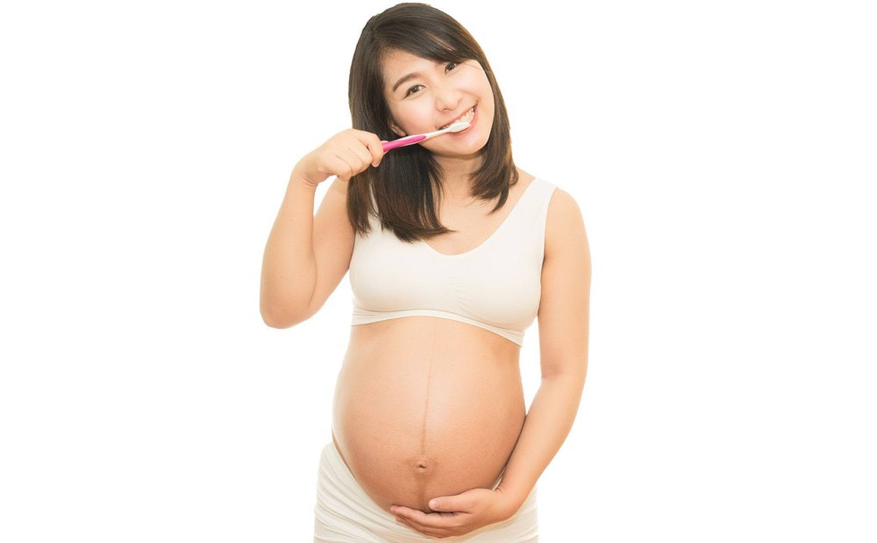 3e6c35da134850b2085e021311d5d872_kim-okamura-pregnant-woman-brushing-her-teeth-1000-c-90 (1)